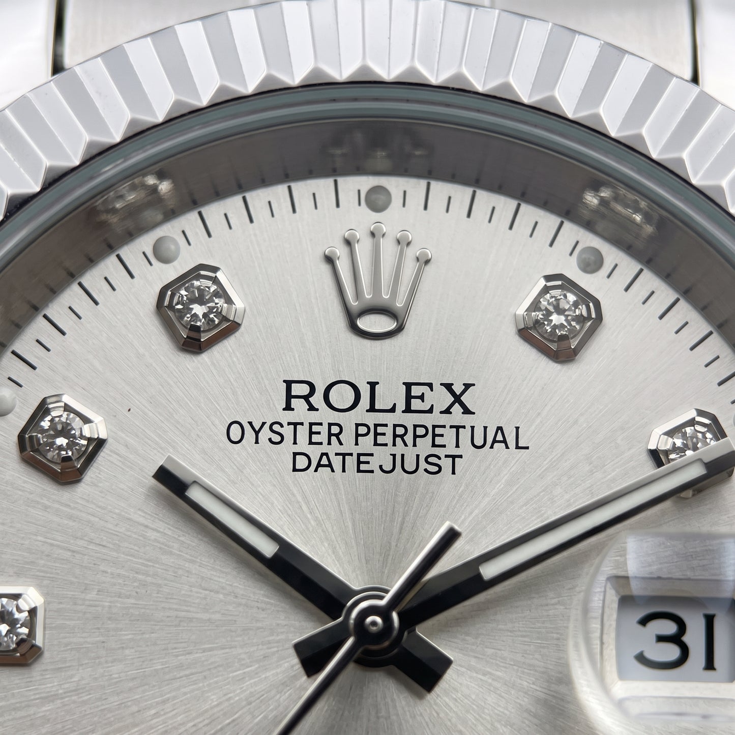 Rolex Men's Silver Datejust Watch – Fluted Bezel, Jubilee Bracelet & Diamond Markers
