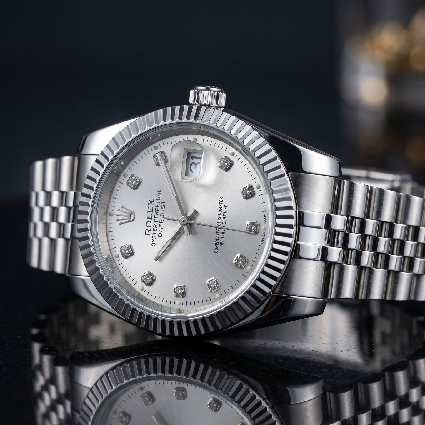Rolex Men's Silver Datejust Watch – Fluted Bezel, Jubilee Bracelet & Diamond Markers